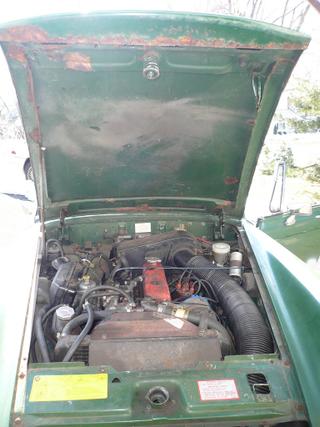 Illustration for article titled Car for a loving owner! 1979 MG midget